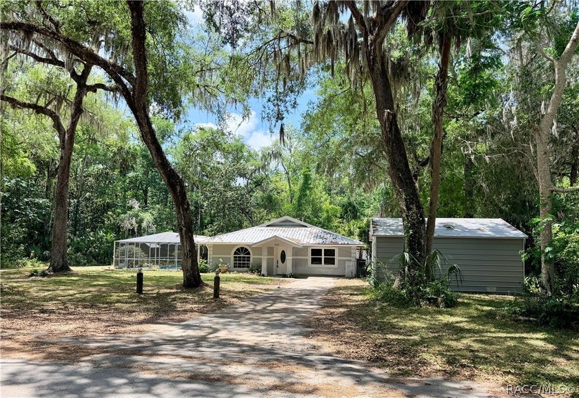 Charming Coastal Retreat with Pool, Garage/workshop & Investment - Beach Home for sale in Crystal River, Florida on Beachhouse.com