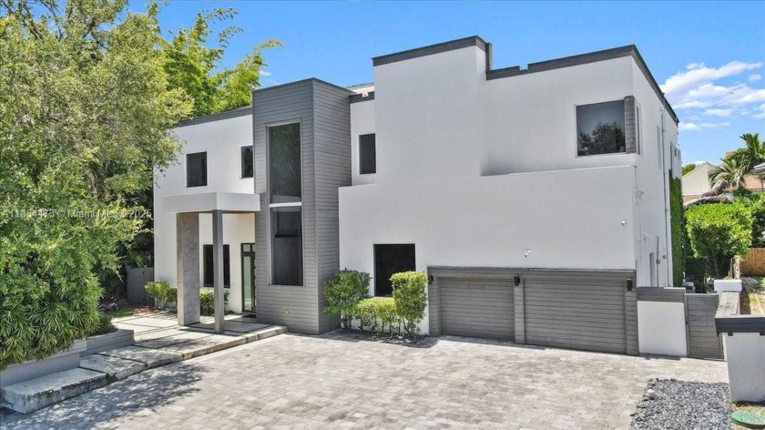 This stunning 5BD/5.5BA estate is nestled in a prestigious gated - Beach Home for sale in Miami, Florida on Beachhouse.com