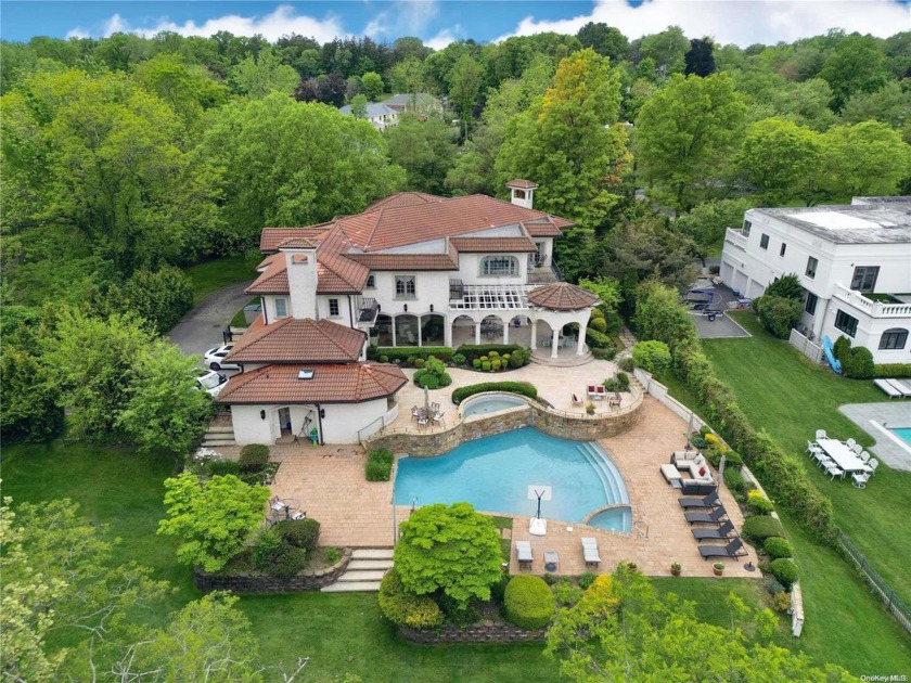 Welcome to this magnificent Mediterranean home nestled in the - Beach Home for sale in Great Neck, New York on Beachhouse.com