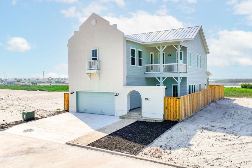 Step into elegance with this newly constructed 4-bedroom - Beach Home for sale in Port Aransas, Texas on Beachhouse.com