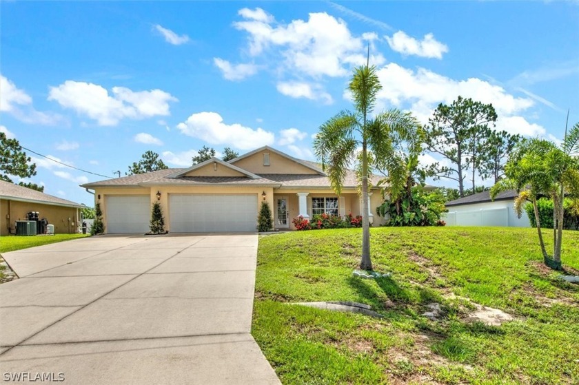 Discover the epitome of spacious and luxurious living in this - Beach Home for sale in Lehigh Acres, Florida on Beachhouse.com