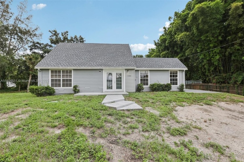 Beautiful 4BD/3BA large lot home in The Acreage with no HOA! - Beach Home for sale in West Palm Beach, Florida on Beachhouse.com