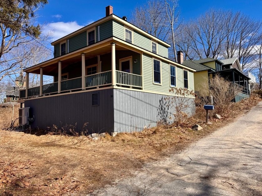 A classic 4-square island cottage with many updates. L-shaped - Beach Home for sale in Portland, Maine on Beachhouse.com