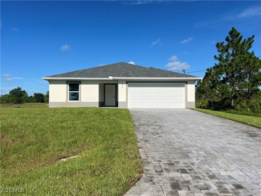 Discover modern living in this stunning, newly constructed - Beach Home for sale in Lehigh Acres, Florida on Beachhouse.com