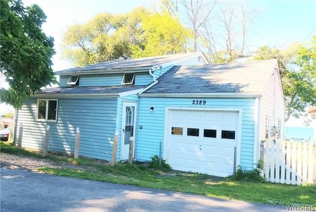 Wake up every day to a beautiful unobstructed view of Lake - Beach Home for sale in Porter, New York on Beachhouse.com