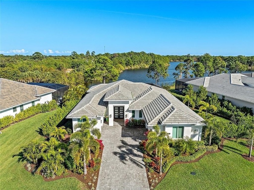 Breathtaking lake view with contemporary upgrades in this - Beach Home for sale in Vero Beach, Florida on Beachhouse.com