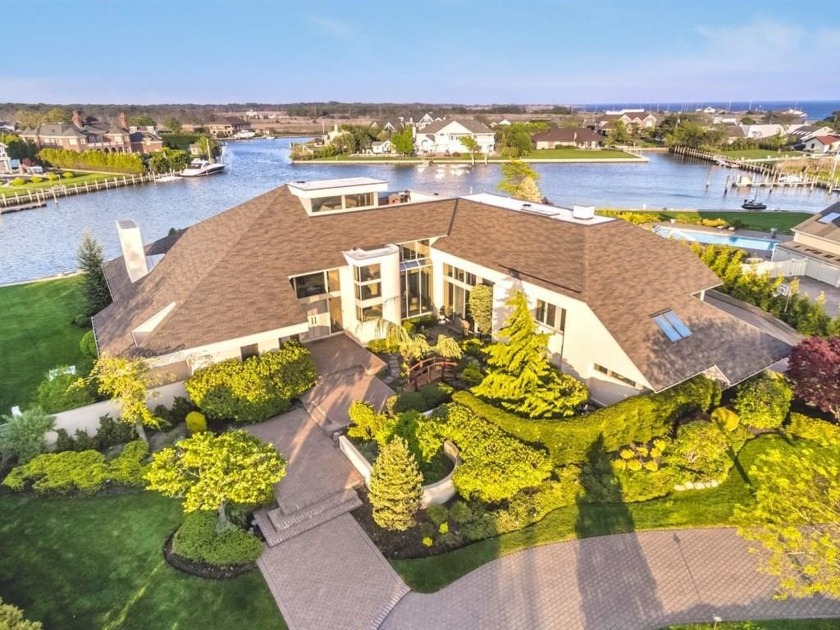 Welcome To The Moorings. A One-Of-A-Kind Contemporary Sitting On - Beach Home for sale in East Islip, New York on Beachhouse.com