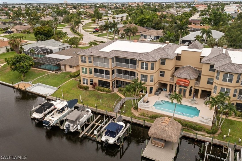 Discover the epitome of waterfront living in this stunning - Beach Condo for sale in Cape Coral, Florida on Beachhouse.com