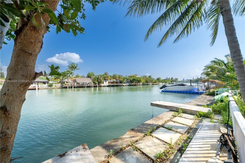 Live on the water's edge at this tranquil escape! Located away - Beach Condo for sale in Miami Beach, Florida on Beachhouse.com