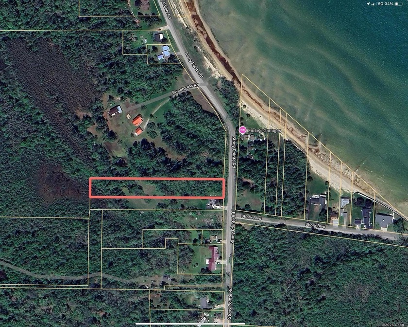 Steps from Lake Huron public access, this 1.53-acre wooded - Beach Lot for sale in Cheboygan, Michigan on Beachhouse.com
