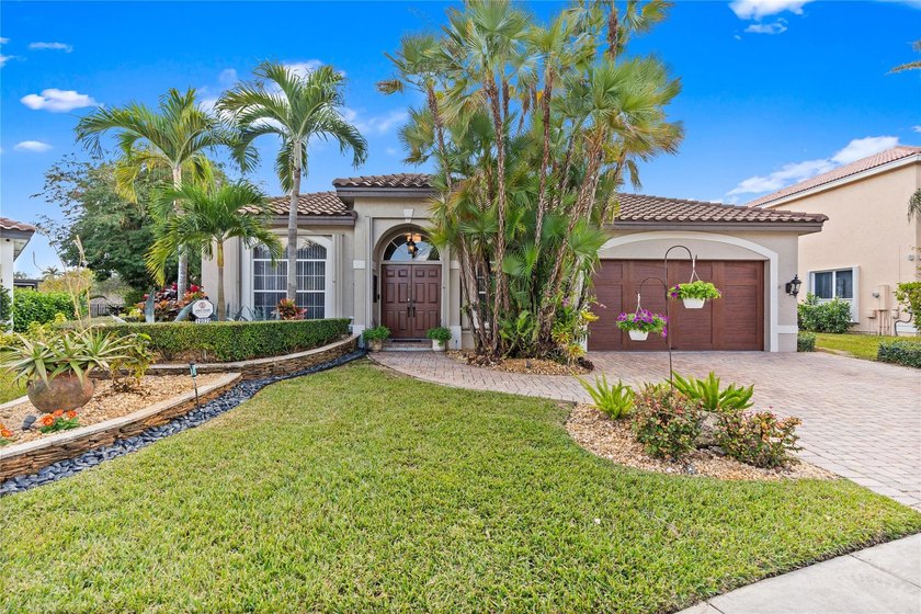 Beautiful 3-bedroom, 2-bath home with a 2-car garage on an - Beach Home for sale in Miramar, Florida on Beachhouse.com