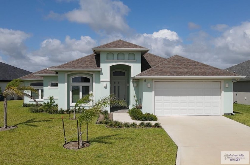 Welcome to this stunning lakefront single-family home, a perfect - Beach Home for sale in Laguna Vista, Texas on Beachhouse.com