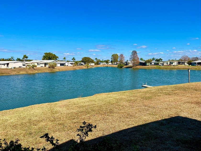 WATERFRONT OPPORTUNITY!    2BR/2BA DOUBLEWIDE Fixer-Upper! - Beach Home for sale in Ellenton, Florida on Beachhouse.com