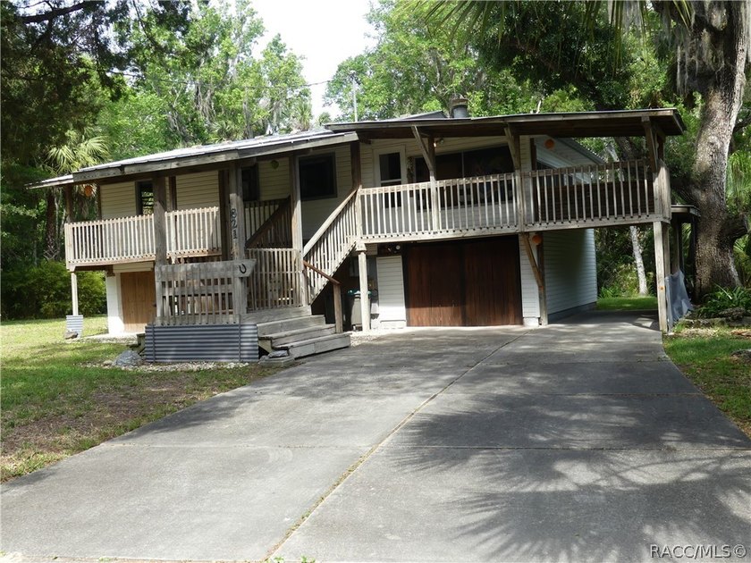 This 1959 very unique 2-bedroom One-bath stilt home is located - Beach Home for sale in Crystal River, Florida on Beachhouse.com