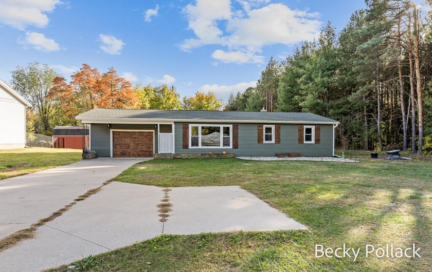 Welcome to 1721 E Pontaluna Rd - a beautifully updated 3-bed - Beach Home for sale in Spring Lake, Michigan on Beachhouse.com