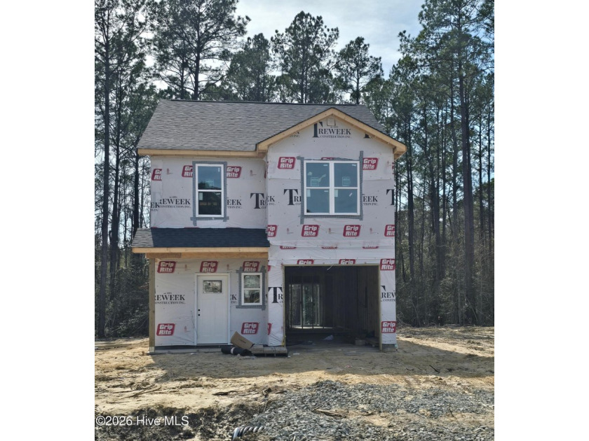 Welcome to life in Neuse Point East, where wooded surroundings - Beach Home for sale in Havelock, North Carolina on Beachhouse.com