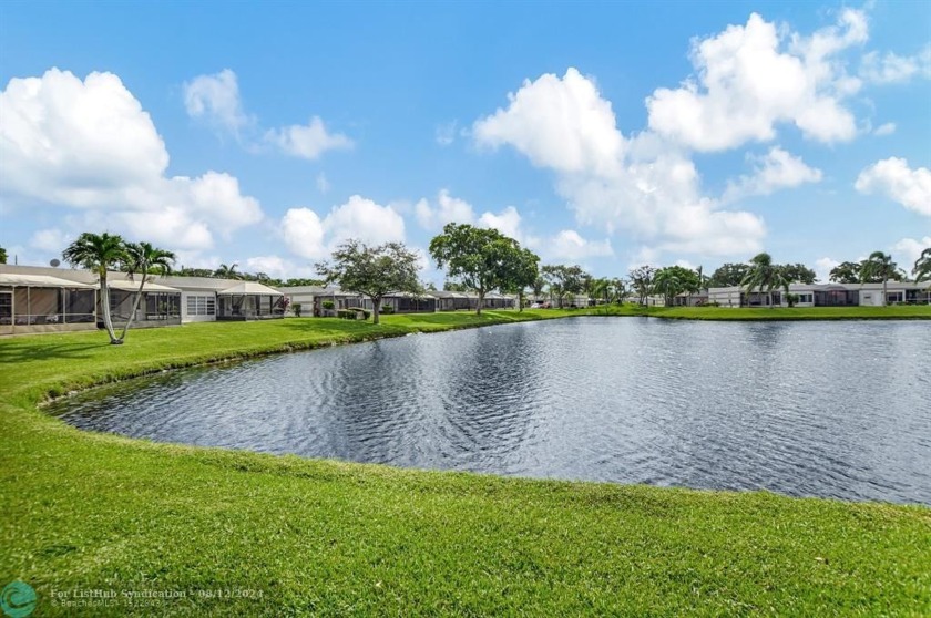 Welcome home to this WATER VIEW 2 bdrm, 2 bath villa w/attached - Beach Condo for sale in Boca Raton, Florida on Beachhouse.com