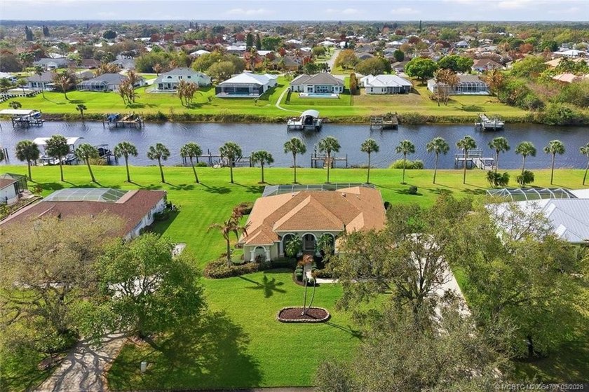 Discover this Beautiful Waterfront Estate Home offering the - Beach Home for sale in Port Saint Lucie, Florida on Beachhouse.com