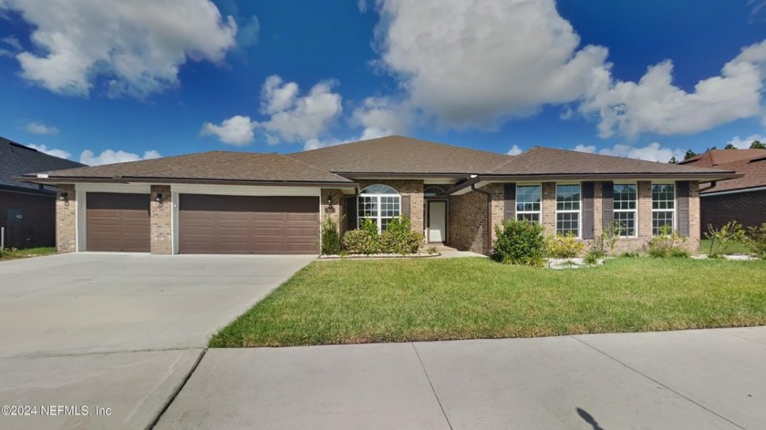 Beautiful 4/3 brick beauty featuring a 3 car garage. Newly - Beach Home for sale in Jacksonville, Florida on Beachhouse.com