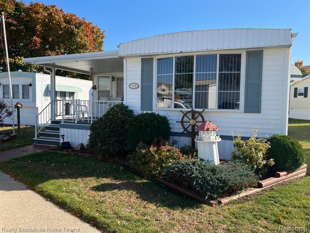This 1973 American single wide approx. 14 x 66 Manufactured Home - Beach Home for sale in Port Sanilac, Michigan on Beachhouse.com