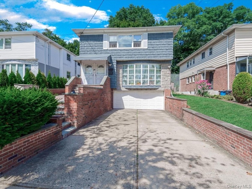 Exceptional opportunity in Douglaston! This spacious two-family - Beach Home for sale in Douglaston, New York on Beachhouse.com