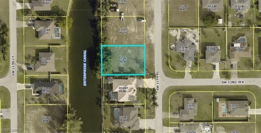 Build your dream home here. Beautiful 10,625 sq-ft fresh water - Beach Lot for sale in Cape Coral, Florida on Beachhouse.com