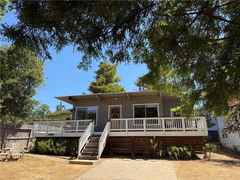 This mid-century cottage is tucked behind mature redwood trees - Beach Home for sale in Cambria, California on Beachhouse.com