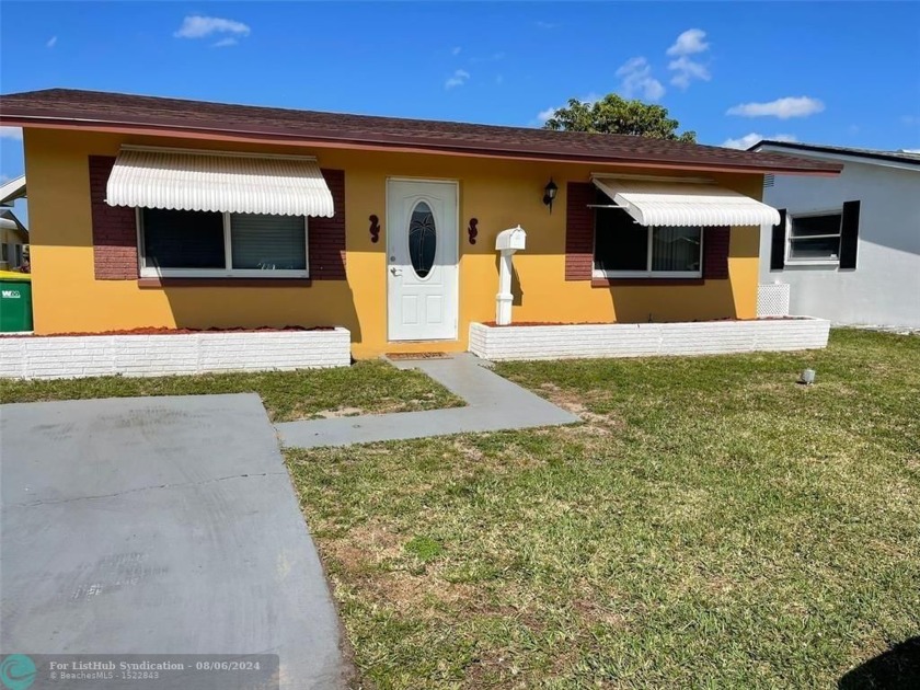 SPACIOUS 2 BEDROOMS , 1 BATHROOM SINGLE FAMILY HOME IN MAINLANDS - Beach Home for sale in Tamarac, Florida on Beachhouse.com