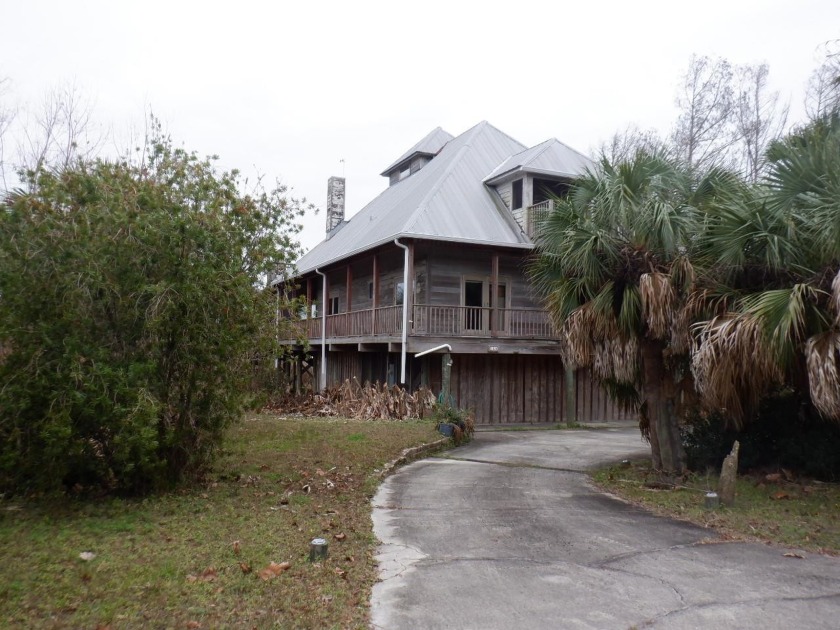Great 3 bed 2 bath two story home on the bay with a private dock - Beach Home for sale in Apalachicola, Florida on Beachhouse.com