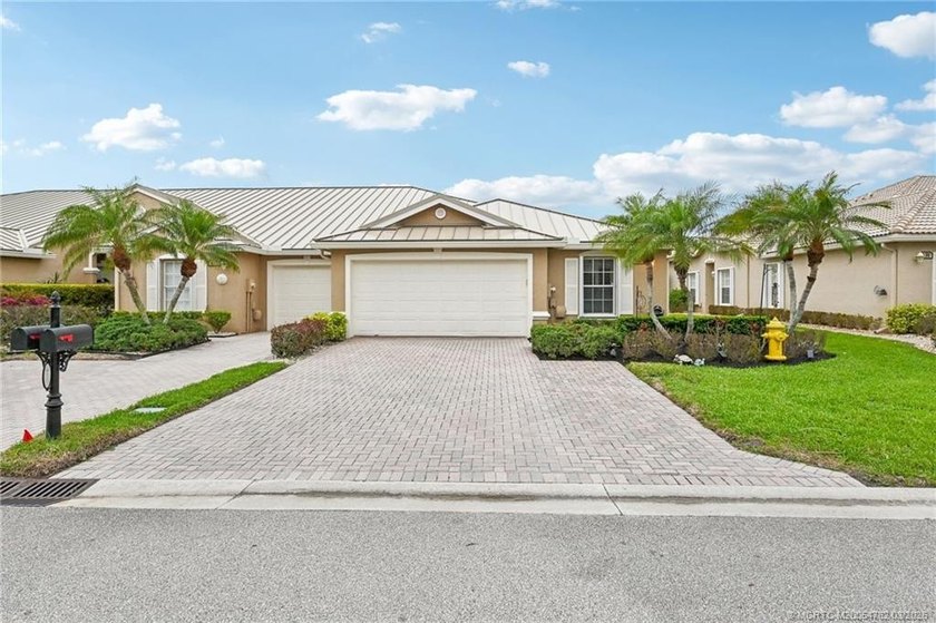 Enjoy stunning golf course and pond views from the expansive - Beach Home for sale in Jensen Beach, Florida on Beachhouse.com