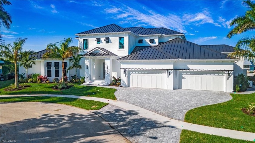 This elegant waterfront estate offers professionally designed - Beach Home for sale in Marco Island, Florida on Beachhouse.com