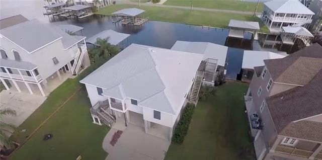 WOW! Check out this Magnificent Myrtle Grove Waterfront - Beach Home for sale in Port Sulphur, Louisiana on Beachhouse.com