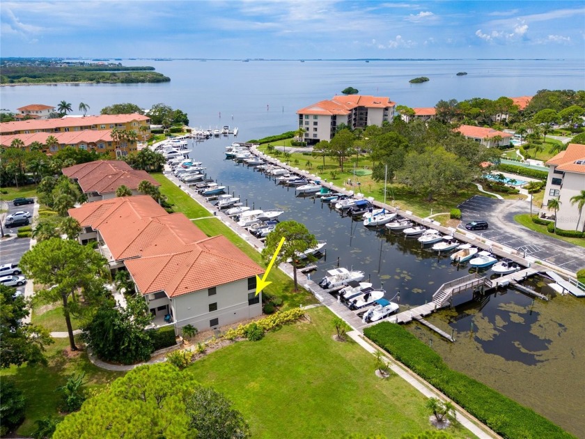 This desirable end-unit condo is light and bright, featuring 2 - Beach Condo for sale in Tarpon Springs, Florida on Beachhouse.com