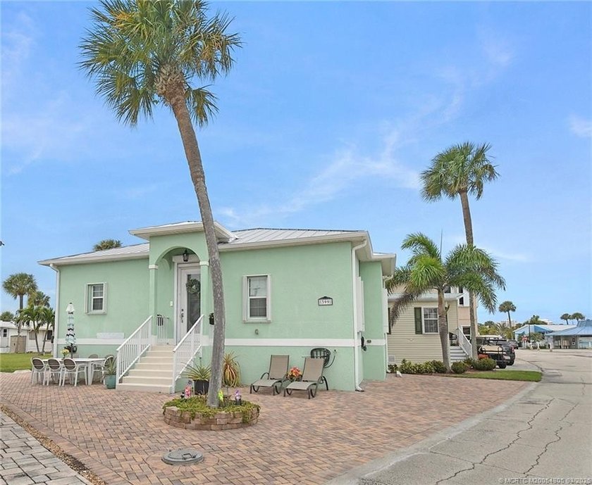 Beautiful coastal cottage in the sought-after Holiday Out - Beach Home for sale in Jensen Beach, Florida on Beachhouse.com