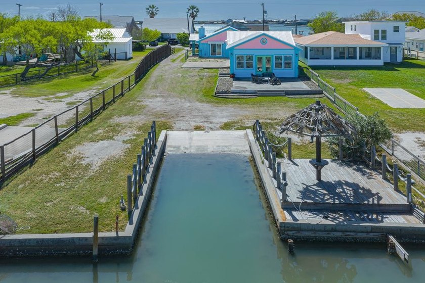 Fish, relax, and invest--this waterfront coastal retreat has it - Beach Home for sale in Rockport, Texas on Beachhouse.com