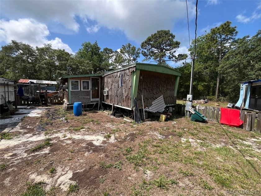 Situated on a half-acre homesite, this property offers - Beach Home for sale in Homosassa, Florida on Beachhouse.com