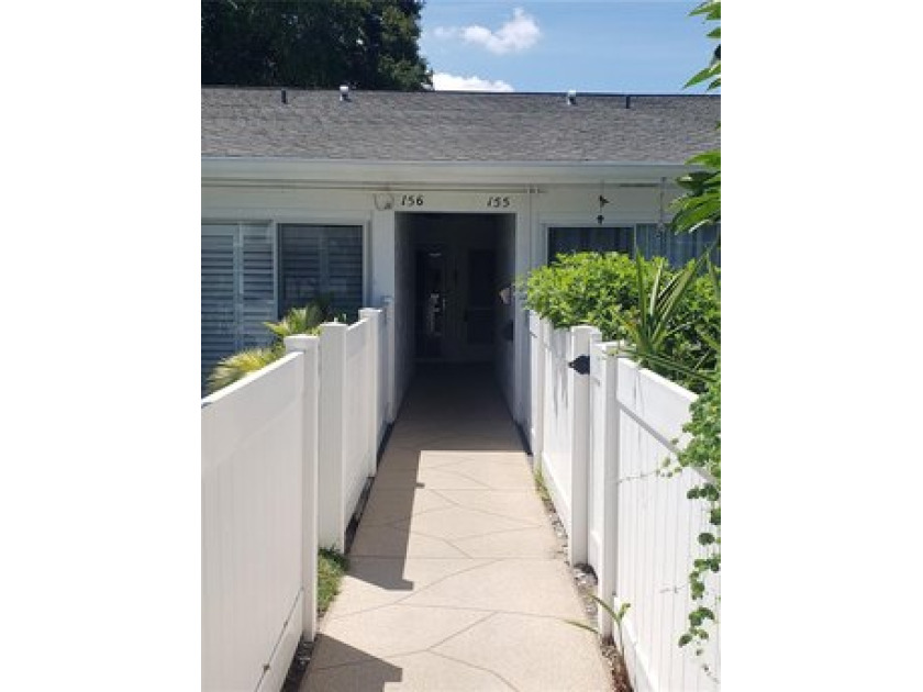 This 1st floor 2/2 Italian style villa is just waiting for you - Beach Home for sale in Clearwater, Florida on Beachhouse.com