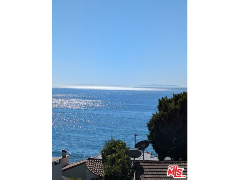 Panoramic ocean views, golden sunsets, and peaceful sea breezes - Beach Lot for sale in Pacific Palisades, California on Beachhouse.com