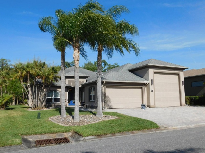 This luxurious custom-built home features poured-in-place - Beach Home for sale in Titusville, Florida on Beachhouse.com