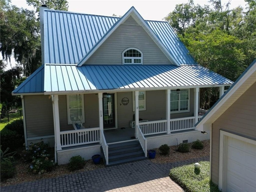 Live the river life! This 4-bedroom, 3-bath coastal home in the - Beach Home for sale in Woodbine, Georgia on Beachhouse.com