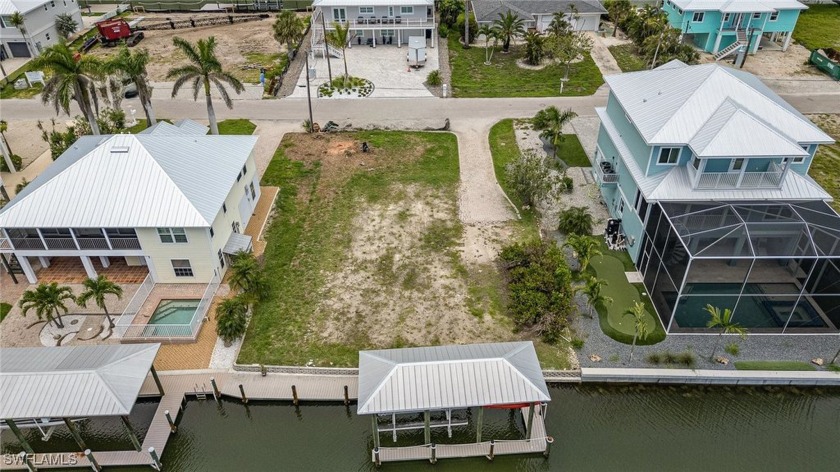 Opportunity knocks! This spacious 71 ft x 108 ft canal-front lot - Beach Lot for sale in Fort Myers Beach, Florida on Beachhouse.com