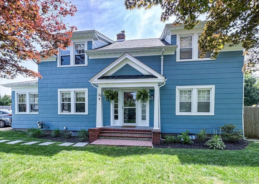 Welcome to this beautifully updated 5-bedroom, 3-bath Colonial - Beach Home for sale in Blue Point, New York on Beachhouse.com