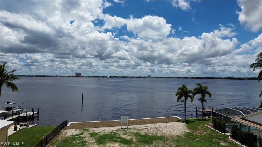 Welcome to this oversized Riverfront lot in the desirable Yacht - Beach Lot for sale in Cape Coral, Florida on Beachhouse.com