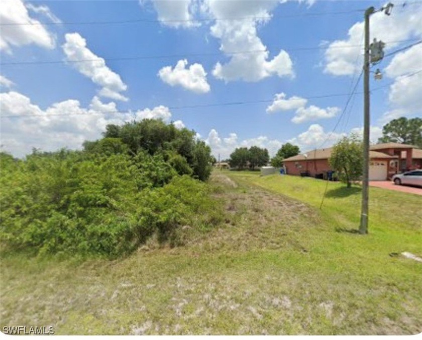 This oversized canal lot offers ample space and flexibility for - Beach Lot for sale in Lehigh Acres, Florida on Beachhouse.com