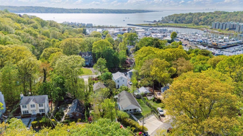 Glen Cove. Tucked into a quiet, private spot just minutes from - Beach Home for sale in Glen Cove, New York on Beachhouse.com