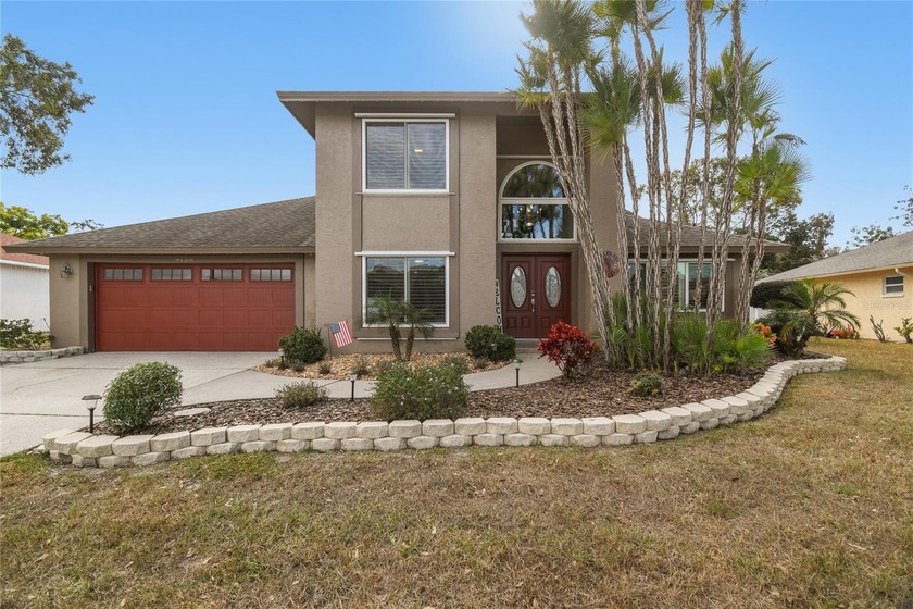 Beautifully updated 3-bedroom pool home located on an oversized - Beach Home for sale in New Port Richey, Florida on Beachhouse.com