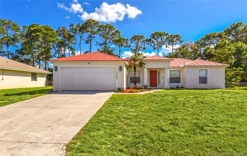 Move In Ready With 2022 METAL ROOF, Concrete Block Home Offers 3 - Beach Home for sale in Port Saint Lucie, Florida on Beachhouse.com
