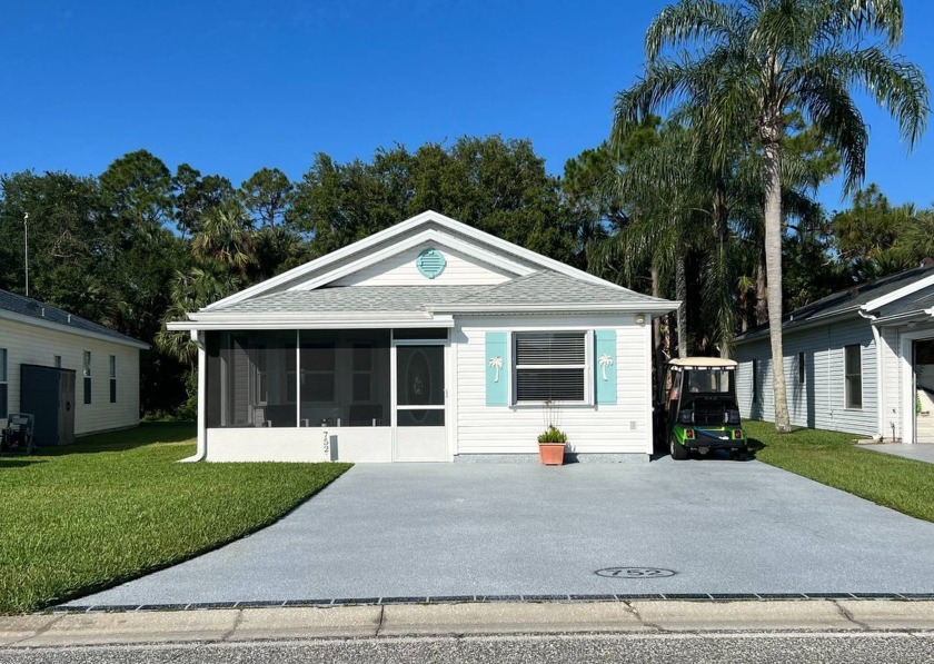 This spacious 2-bedroom, 2-bathroom villa offers approximately 1 - Beach Home for sale in Titusville, Florida on Beachhouse.com