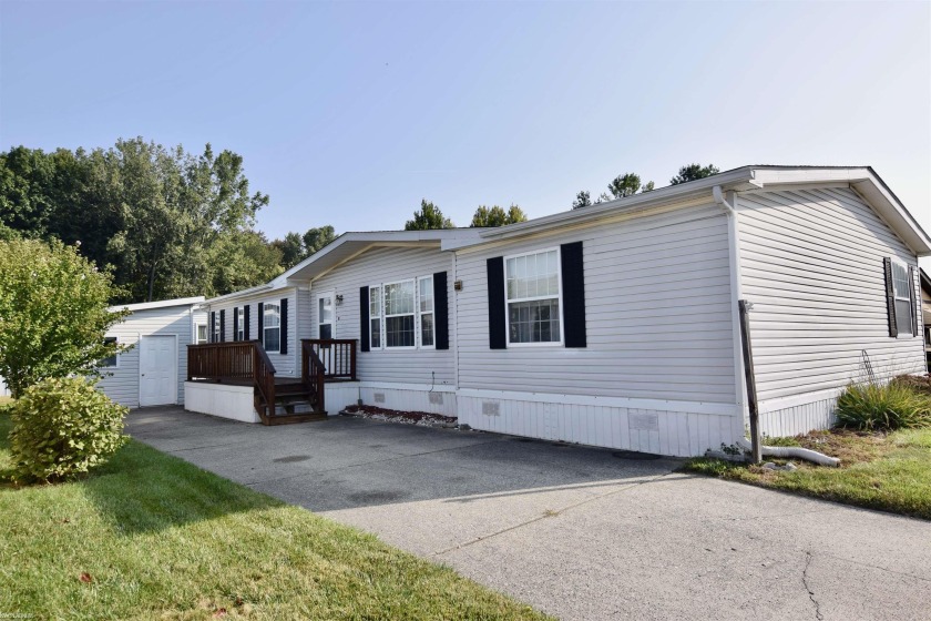 With three bedrooms and two bathrooms, this home well-suited for - Beach Home for sale in Shelby, Michigan on Beachhouse.com