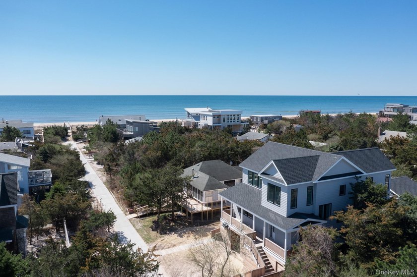 Welcome to 44 Island Walk, a gorgeous, brand-new build located - Beach Home for sale in Lonelyville, New York on Beachhouse.com